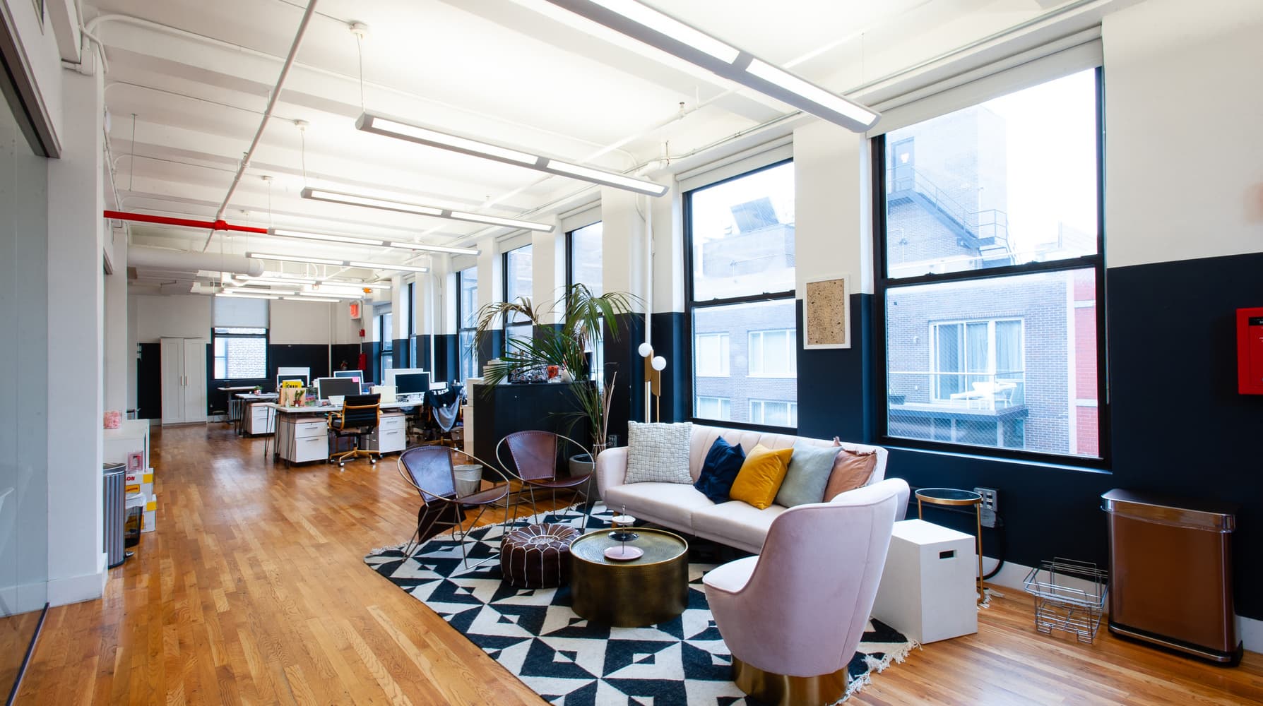 Representative 11th-floor lounge with abundant natural light at Chelsea Castle